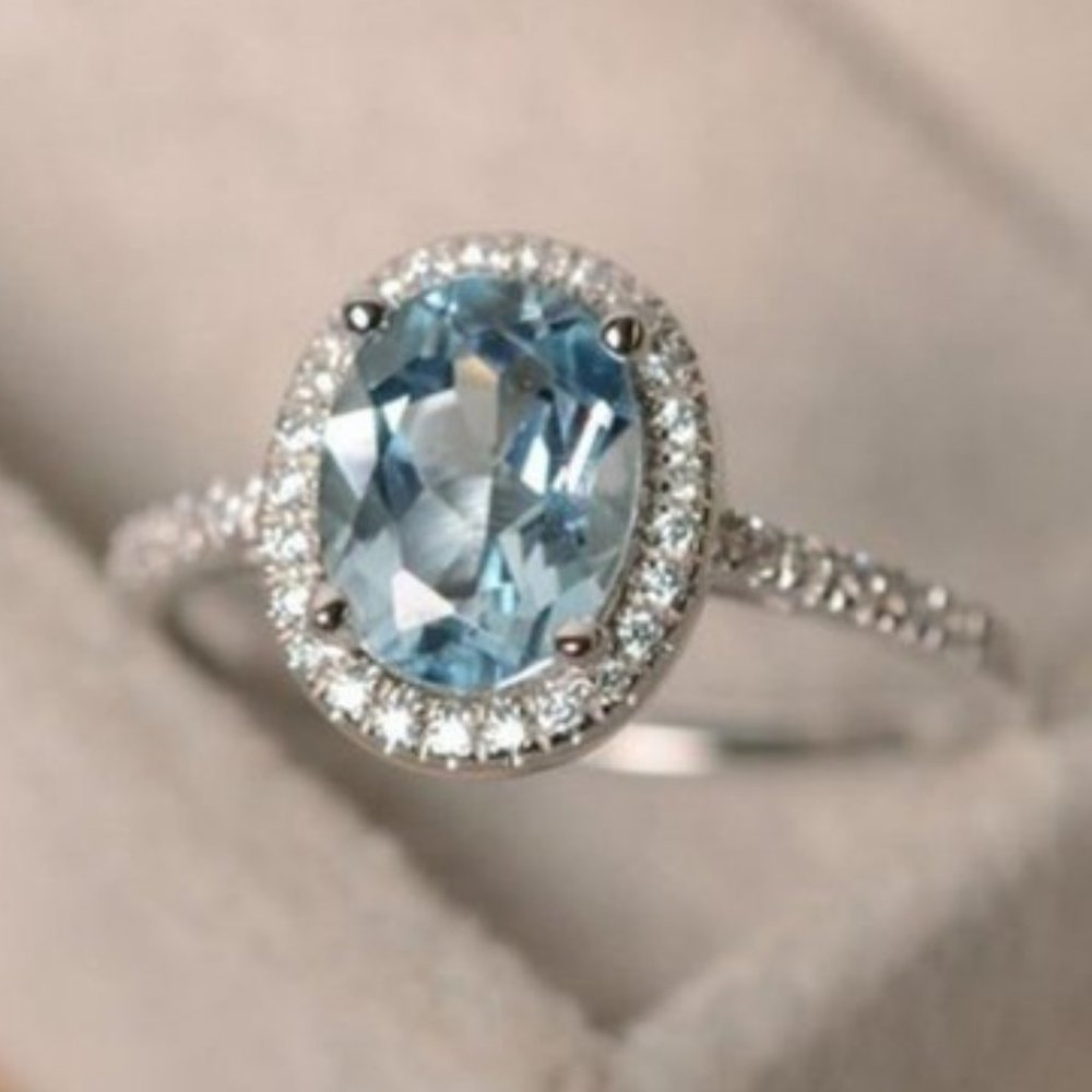 Aquamarine Oval Halo Ring in Light Blue